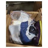 Box full of baby and toddler clothes