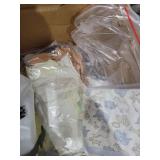 Box full of baby and toddler clothes