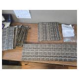 $180 30" Tall Gray Wicker Table with Tempered Glass Top and Two Ottomans