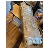 A box of corrugated metal sheeting with posts. 65 x 17