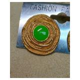 Gold Tone Spiral Earrings with Green Cabochon