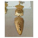 Gold Tone Face Design Dangle Earrings