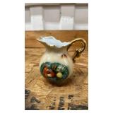 Decorative Porcelain Creamer with Floral Design