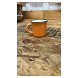 Robert Stanley Orange Enamel Coffee Mug 2 inches tall