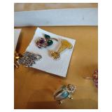 Collection of Decorative Pins and Brooches