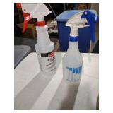 Two water bottles and a spice rack