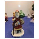 Traditional Santa Claus Figurine with Staff and Tree
