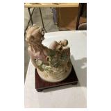 Classical Porcelain Figurine with Cherub