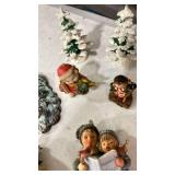Christmas decorated figures, with Snow-Covered Trees