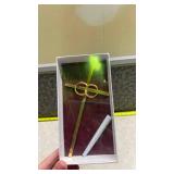 Gold Tone Cross with Double Rings