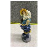 Santa Holding a Child Decorative Figurine