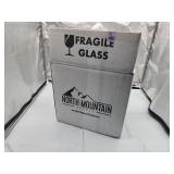 Case of 12 clear wine bottles with caps . NEW