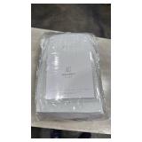 Haven White Polyester Solid 104 in. W x 84in. L Rod Pocket Patio Blackout Curtain (Single Panel) - Retail: $133