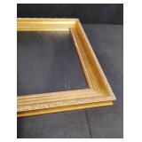 Ornate Gold Mirror with Floral Pattern