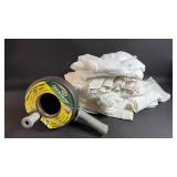 Sizable Heap Shop Towels and Pistol Grip Drum Auger