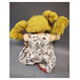 VINTAGE CABBAGE PATCH KID GIRL BLONDE HAIR BLUE EYES BESIDES A LITTLE LOVE INC ON HER FACE SHE IS STILL IN GREAT CONDITION FOR HER AGE