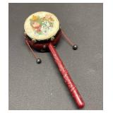 BEAUTIFUL! Vintage, This is a two-sided drum with a handle in the middle and beater beads off each side