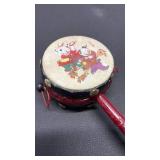 BEAUTIFUL! Vintage, This is a two-sided drum with a handle in the middle and beater beads off each side
