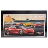 Dukes of Hazzard Scrapbook and Aluminum Corvette Sign ( 16 by 8 inches)