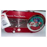 North Pole Radio Christmas Music Player, Plays news about Elves working and music.  - Retail: $39