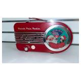 North Pole Radio Christmas Music Player, Plays news about Elves working and music.  - Retail: $39
