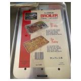 All New in Packages - Griddle, Cake Pan, Oven Guard, Thermometer, Food Mill and a Broiler