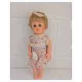 1950s Hard Plastic Doll in Floral Dress