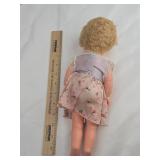 1950s Hard Plastic Doll in Floral Dress