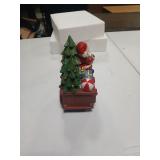 Transpac 7.48 in. Red Christmas Light Up Musical Santa Wagon Ceramic