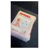 Huggies Size 2 Diapers, Skin Essentials Baby Diapers, Size 2 (12-18 lbs), 26 Count, Packaging May Vary