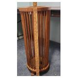 Mid-Century Footed Oak Slatted Umbrella or Cane Stand - has 3 feet.  Isn