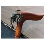Vintage Handcrafted wooden walking stick / cane with Pewter Elephant Head on the handle - approx 35" long