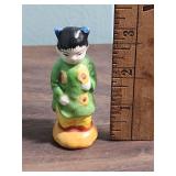 Japanese Porcelain Child Figurine in Green Dress