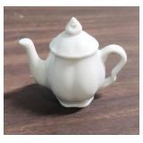 Coronation China Teacup and Saucer from Japan and a miniature teacup/saucer (one piece) and miniature teapot figurines