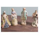 Hand-painted porcelain Victorian-era style figurines, all made in Japan.  Two are marked Lefton China  c1950s