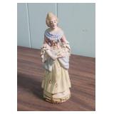 Hand-painted porcelain Victorian-era style figurines, all made in Japan.  Two are marked Lefton China  c1950s