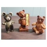 Two vintage Bear toothbrush holders and a vintage Bear thermometer that says "I can bear it, can you".  All are ceramic
