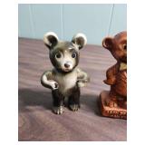 Two vintage Bear toothbrush holders and a vintage Bear thermometer that says "I can bear it, can you".  All are ceramic