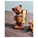 Two vintage Bear toothbrush holders and a vintage Bear thermometer that says "I can bear it, can you".  All are ceramic