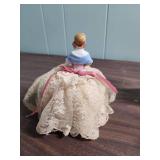 Porcelain Doll with pink cushion like bottom, 1978 Holly Hobbie Figurine, mini shadow box figurine girl, and another ceramic girl with fabric legs that sits