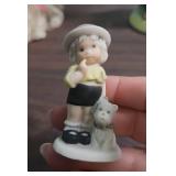 Porcelain Doll with pink cushion like bottom, 1978 Holly Hobbie Figurine, mini shadow box figurine girl, and another ceramic girl with fabric legs that sits