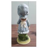 Porcelain Doll with pink cushion like bottom, 1978 Holly Hobbie Figurine, mini shadow box figurine girl, and another ceramic girl with fabric legs that sits