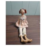 Porcelain Doll with pink cushion like bottom, 1978 Holly Hobbie Figurine, mini shadow box figurine girl, and another ceramic girl with fabric legs that sits