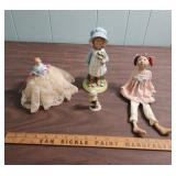 Porcelain Doll with pink cushion like bottom, 1978 Holly Hobbie Figurine, mini shadow box figurine girl, and another ceramic girl with fabric legs that sits