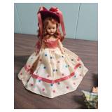 1950s Hard Plastic Dolls with Original Clothing, both feature sleep eyes