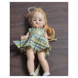 1950s Hard Plastic Dolls with Original Clothing, both feature sleep eyes