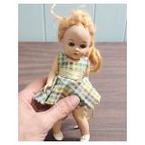 1950s Hard Plastic Dolls with Original Clothing, both feature sleep eyes