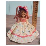 1950s Hard Plastic Dolls with Original Clothing, both feature sleep eyes