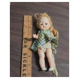 1950s Hard Plastic Dolls with Original Clothing, both feature sleep eyes