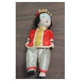 Traditional Japanese Gofun Doll in Festival Attire